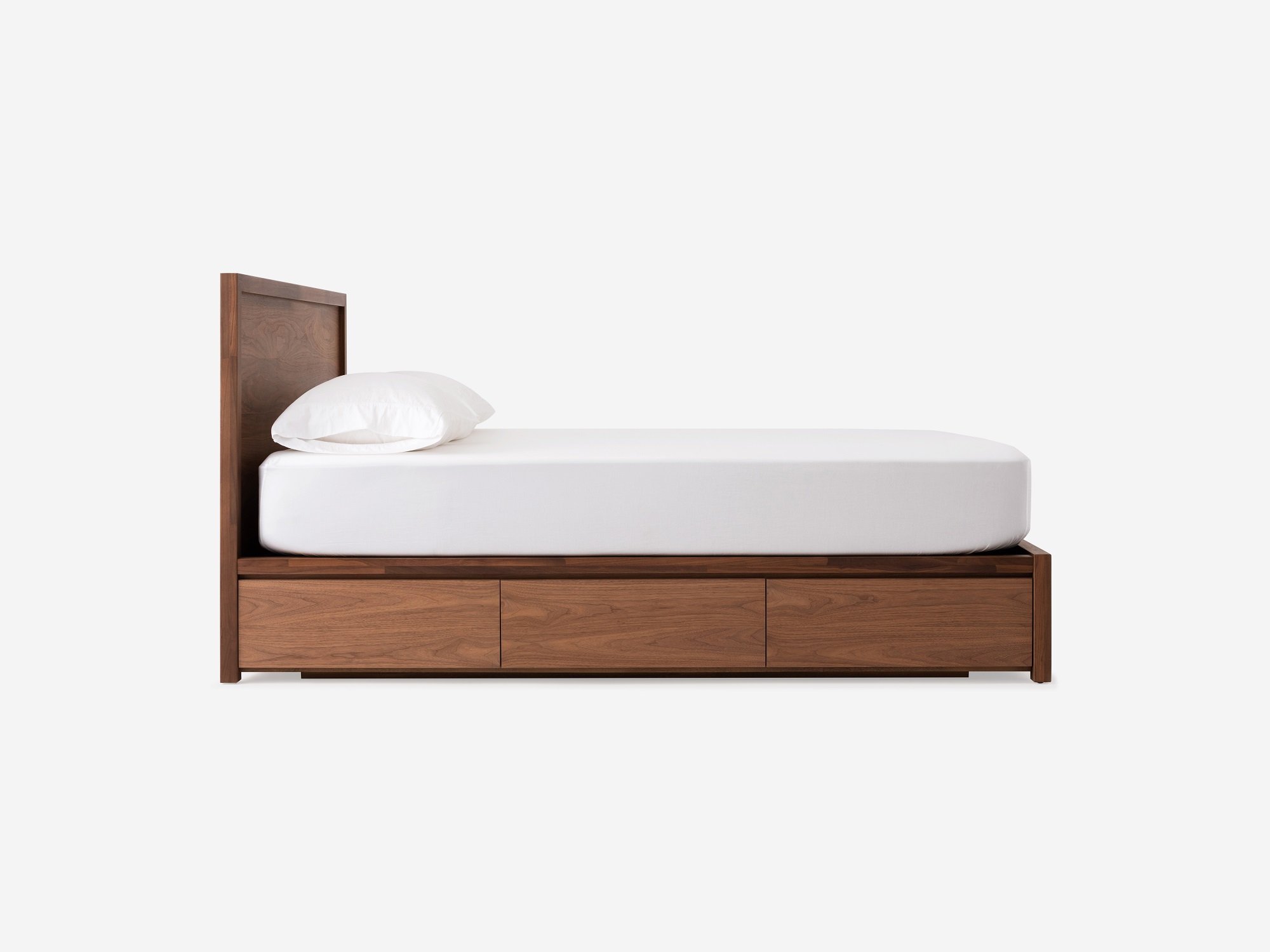 Side view of Marcel drawer storage bed in walnut 